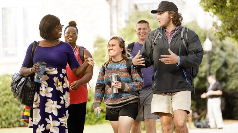 Group of LTSS students walking together on campus after class